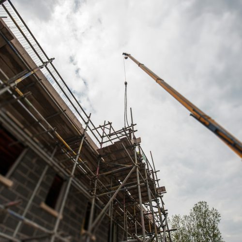 scaffolding-on-building-of-construction-site-85BKD38
